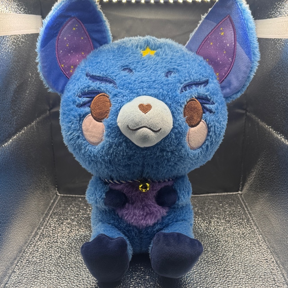 Blue Plush Toy with Purple Accents
